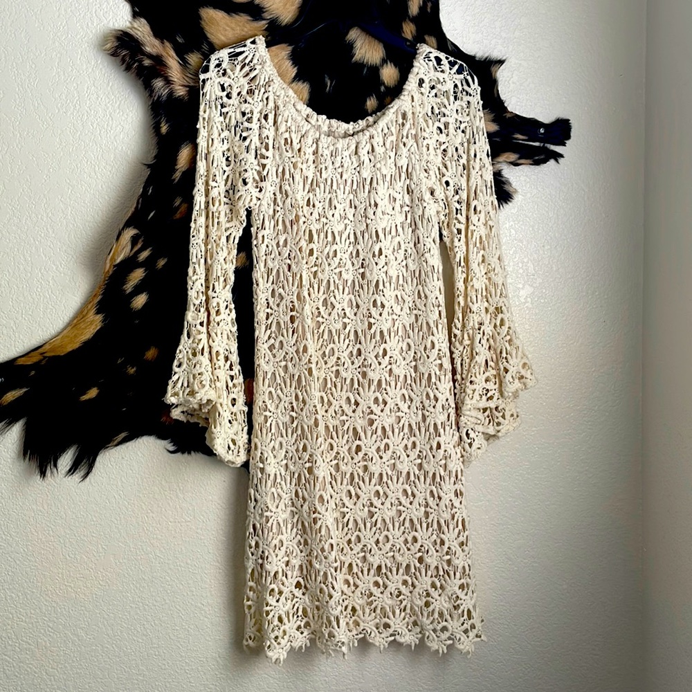 Union of Angels knitted dress. Off the shoulders long sleeve.